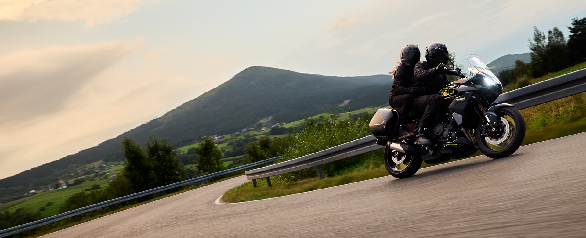 Triumph Tiger Sport 800 riding shot two people on the bike