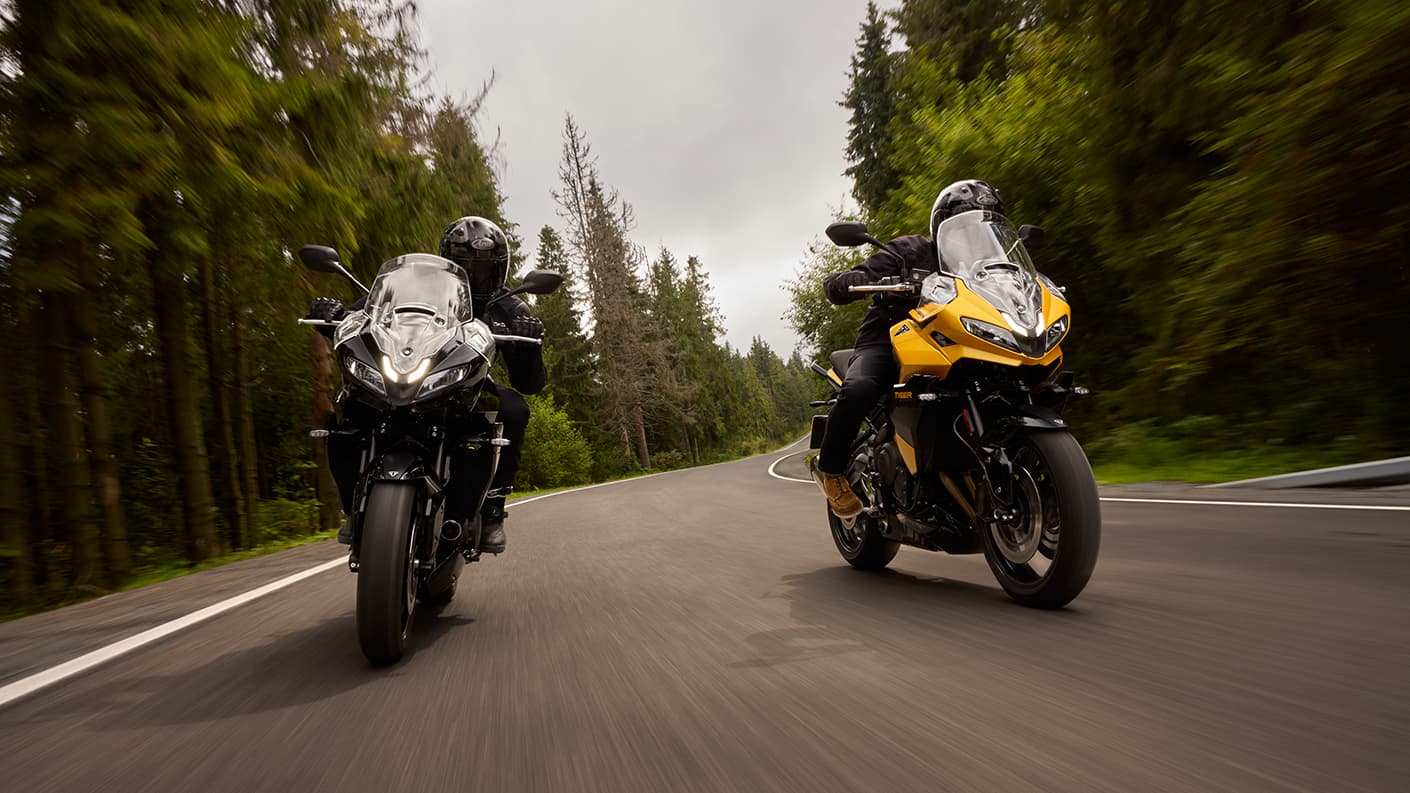 Triumph Tiger Sport 800 two bikes riding side by side
