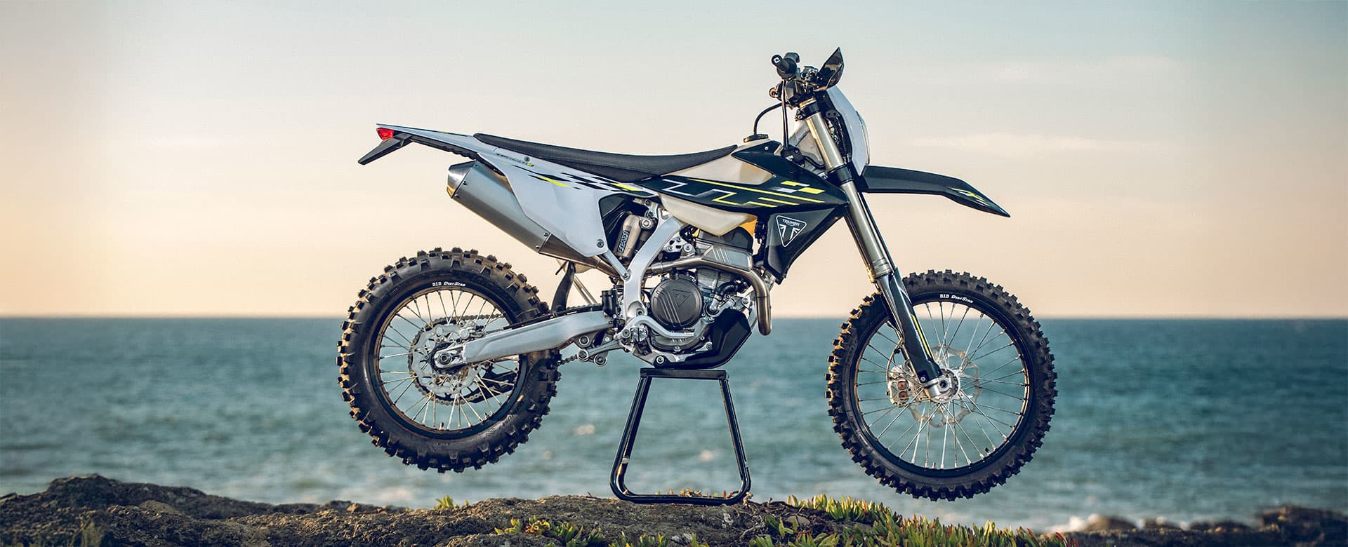 Triumph TF 250-E right hand side by the sea