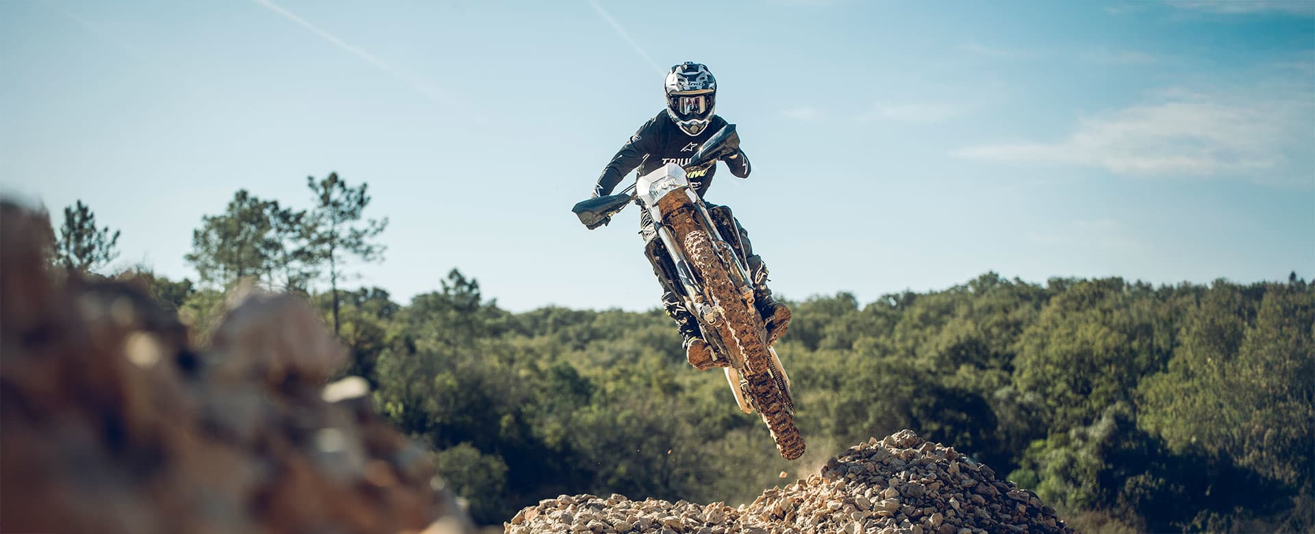 Triumph TF 250-E riding shot straight on