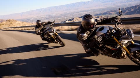 Two riders on the Triumph Speed Triple 1200 RS
