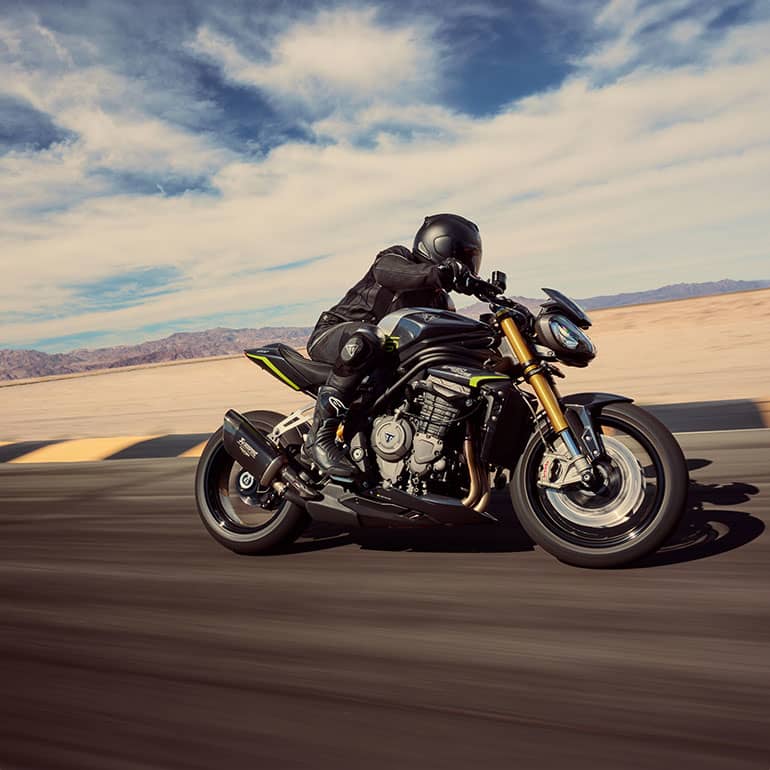Speed Triple 1200 RS with Triumph Clothing on the rider