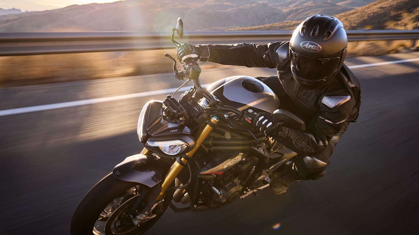 Triumph Speed Triple 1200 RS close up with rider