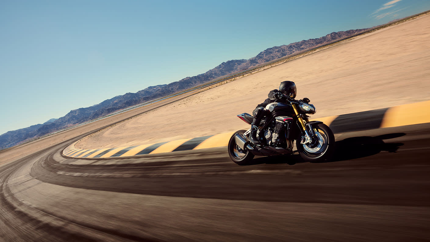 Triumph Speed Triple 1200 RS riding on the track