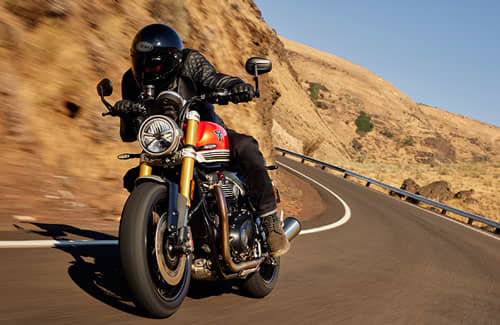 Triumph Speed Twin 1200 RS riding shot on the road